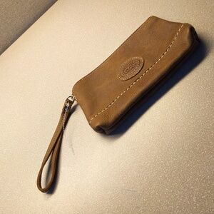 Roots brown cowhide leather clutch